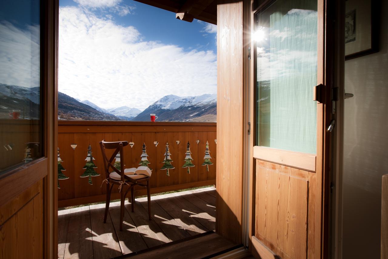 Les Fleurs Bleues Aparthotel Livigno Bagian luar foto